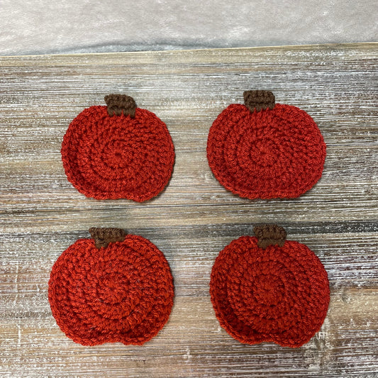 Crochet pumpkin coasters